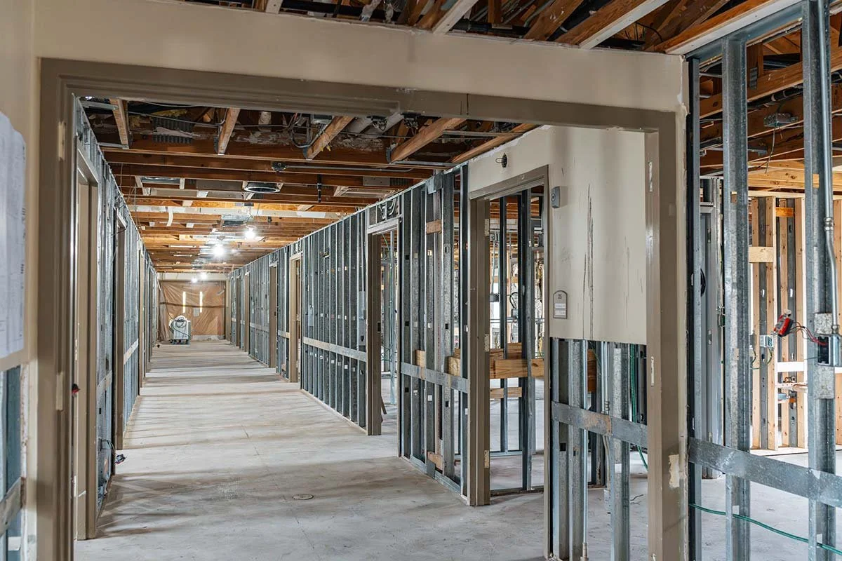 Metal stud framing in a hallway during phased renovation at Anson Health & Rehabilitation