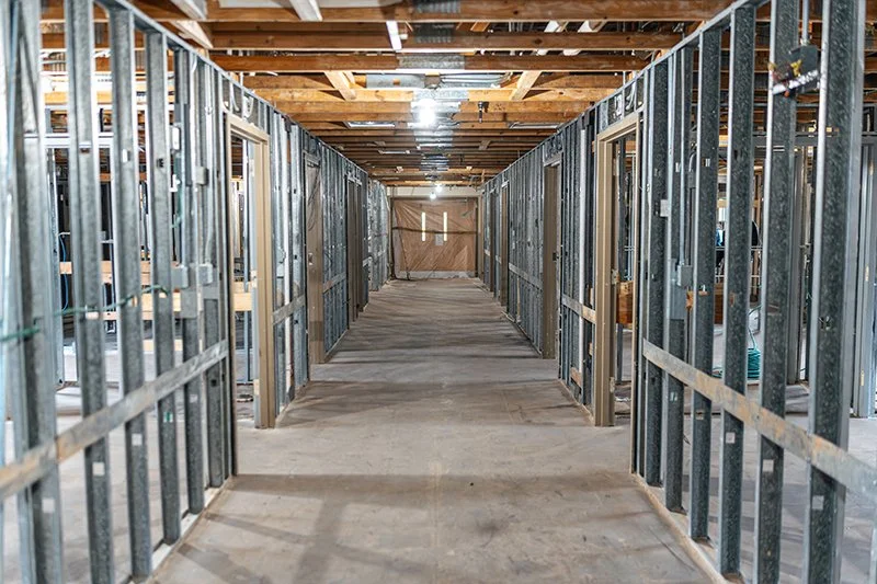 Premier-Design-Construction_Anson-HR_Resident-Room_Exposed-Metal-Studs_Centered.jpg