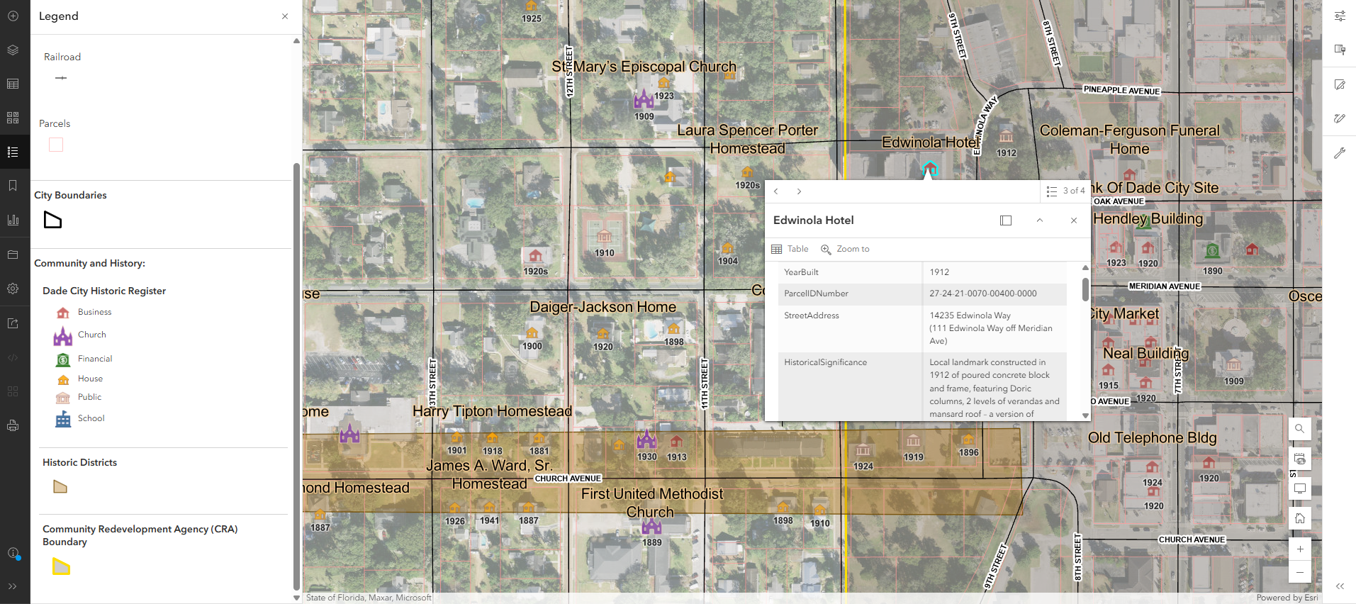 A detailed map of a neighborhood showing parcels, city boundaries, historic districts, and community redevelopment boundaries. It highlights various landmarks including churches, homes, hotels, and municipal buildings, with labels and icons.