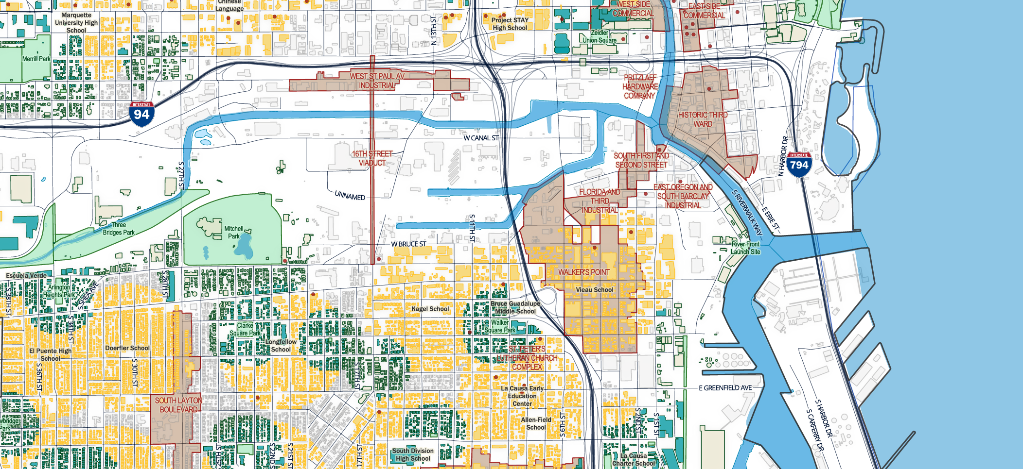 Map of downtown Milwaukee, Wisconsin showing building proximity to schools and parks, including industrial areas with color-coded regions and labeled landmarks.