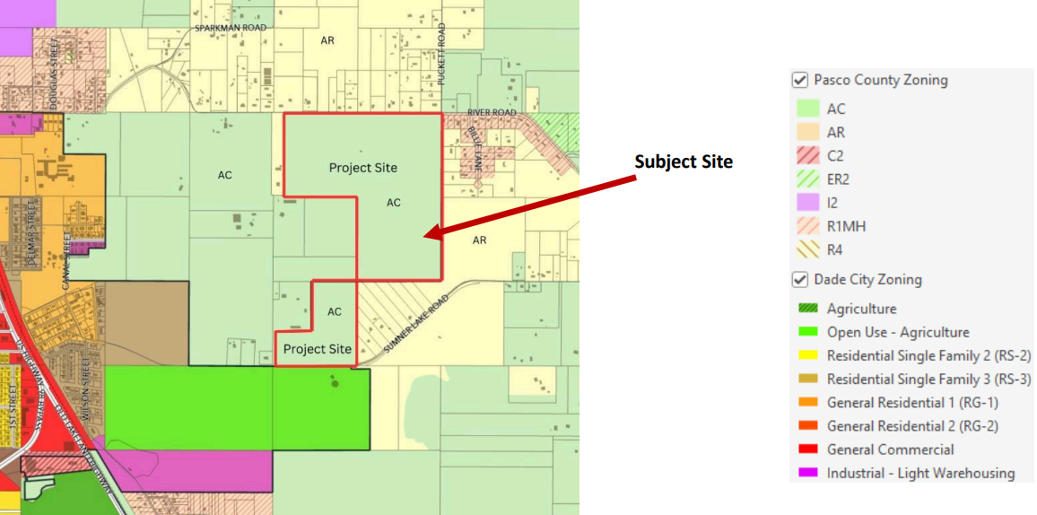 Map showing zones in Pasco and Dade counties, with two project sites marked by red outlines in Pasco County, located in agricultural and residential areas, with a list of zoning categories on the right.