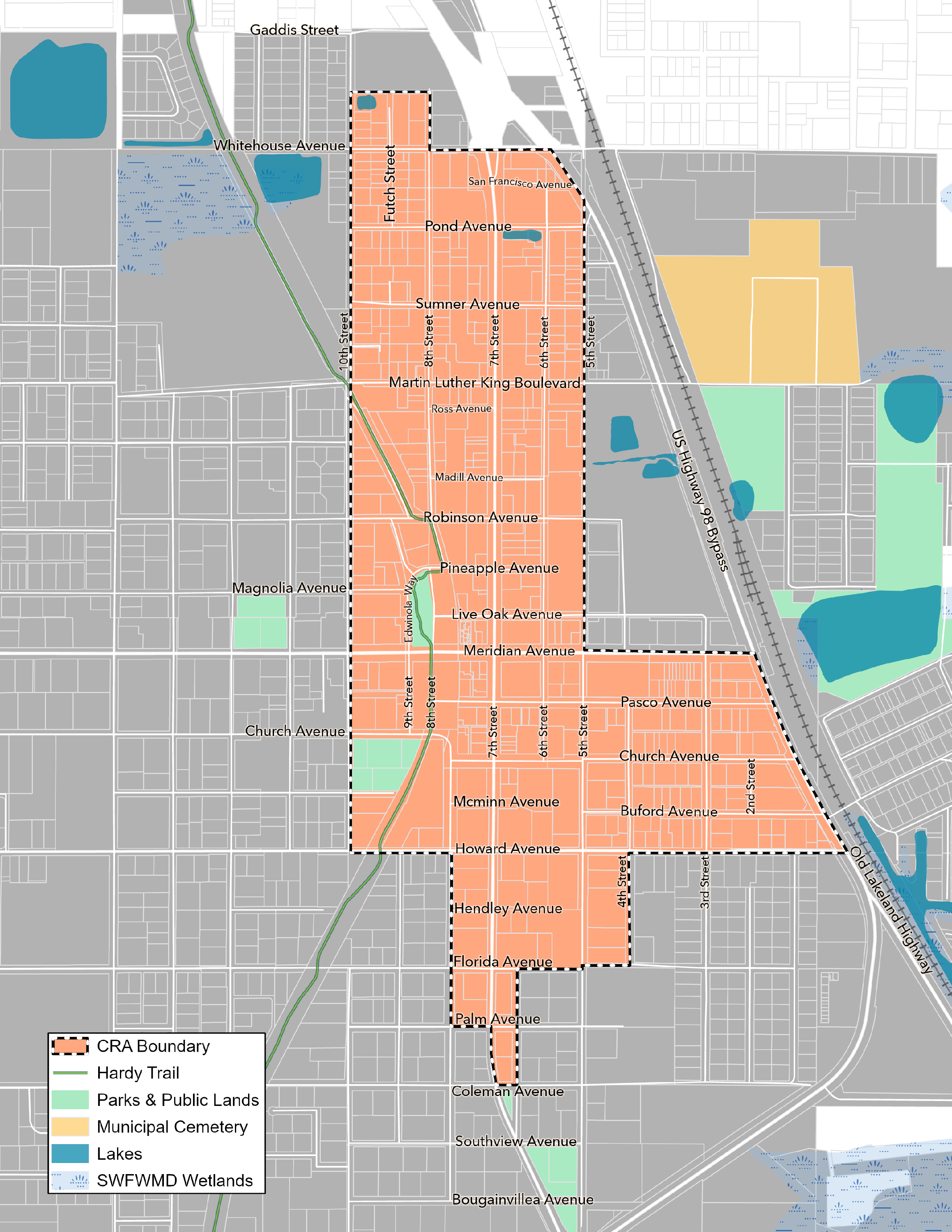 Map of downtown Dade City showing boundaries, streets, parks, lakes in the CRA boundary marked with orange, parks & public lands in green, lakes in blue, wetlands in light blue, and municipal cemeteries in yellow.