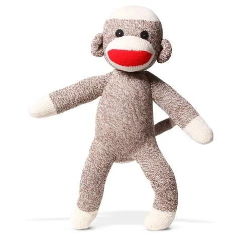A sock monkey plush toy with a red mouth, black eyes, and beige limbs and face, standing upright.