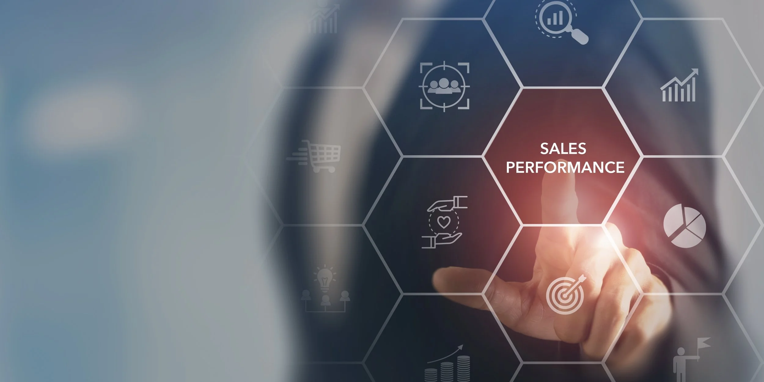 A hand pointing at a digital interface with hexagonal icons related to sales performance, including charts, magnifying glass, target, and pie chart.