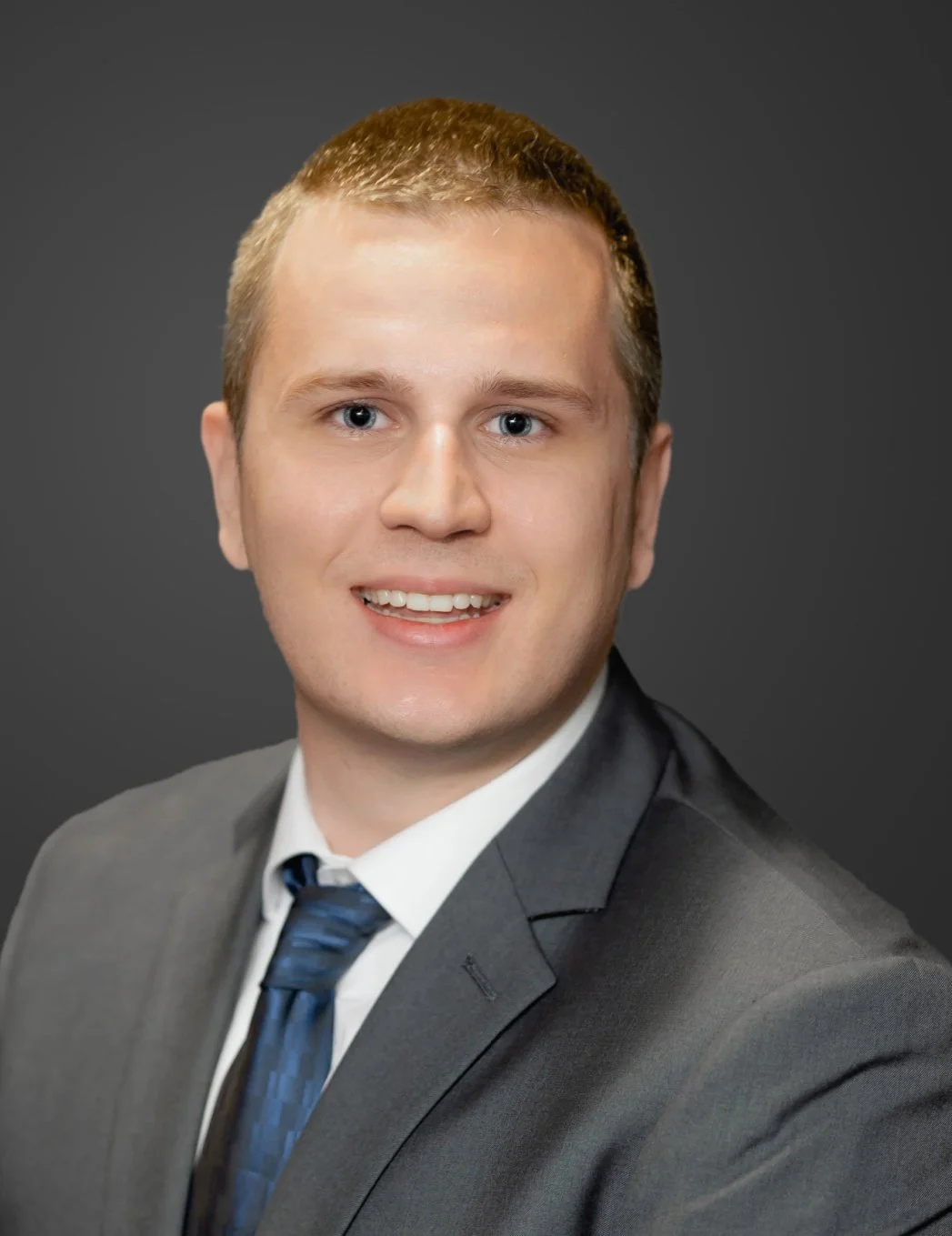 Trevor Yuska, ASA, Financial Analyst