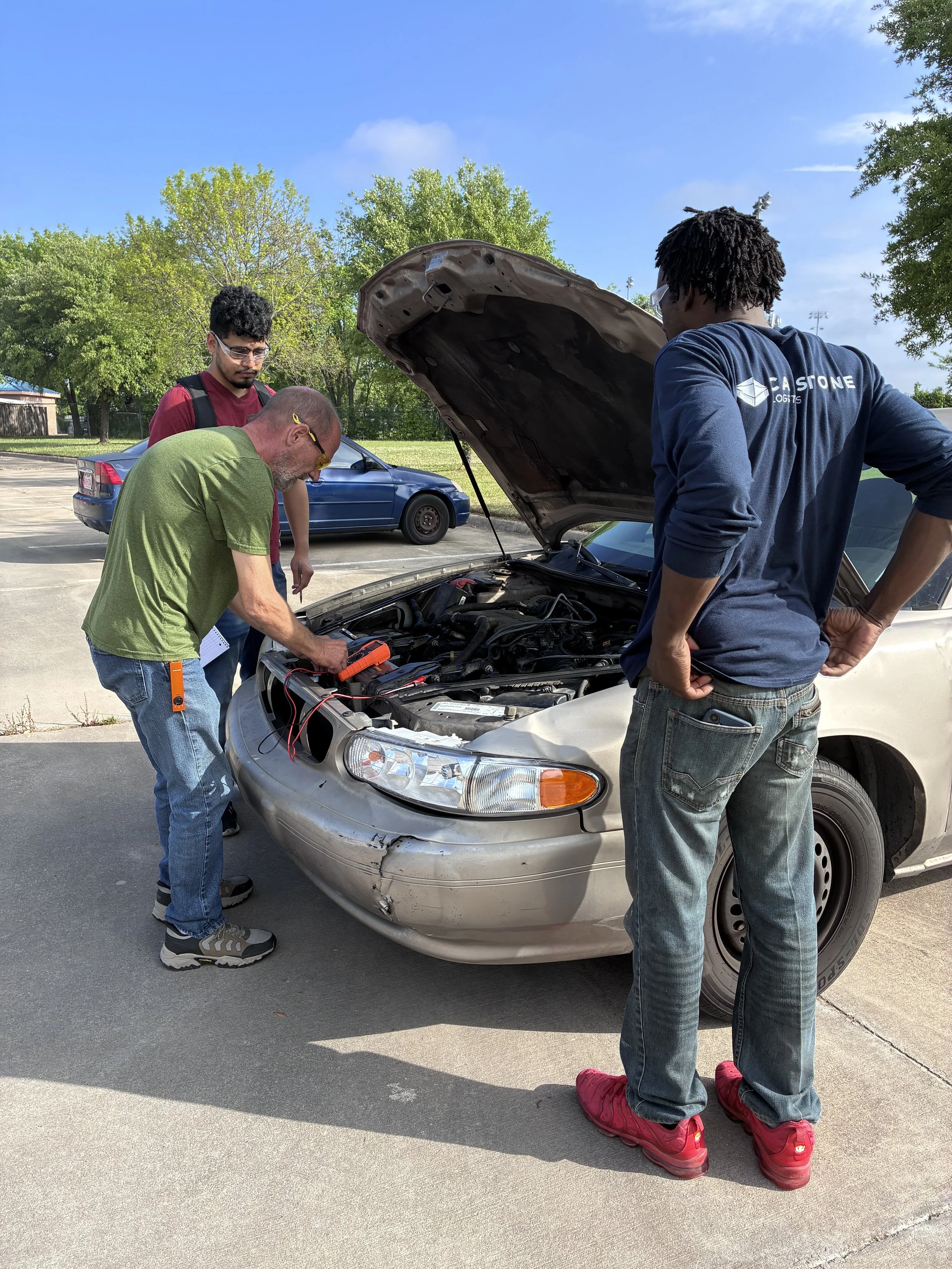 Students training hands-on at Hogg's Automotive Academy