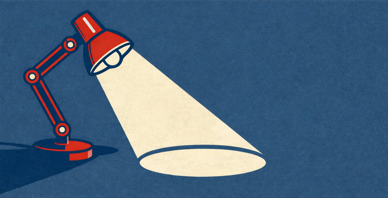 Illustration of a red desk lamp shining light onto a surface, with a blue background.