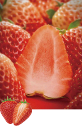 Close-up of a sliced strawberry surrounded by whole strawberries.