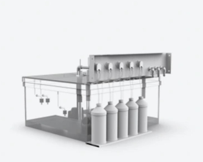 A laboratory setup with multiple bottles and connected tubing for chemical or biological experiments.