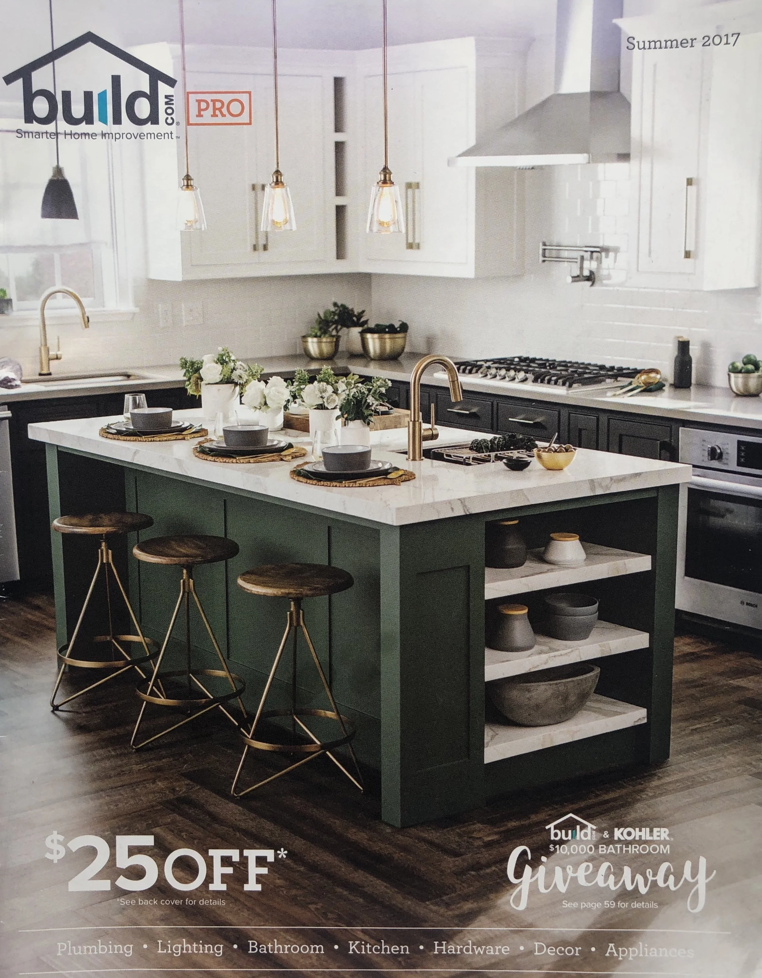 A modern kitchen with white cabinets, a kitchen island with a green base, white countertop, gold fixtures, and black stools. Decorative plants and bowls adorn the space. There is a window, wall-mounted cabinets, a range hood, and a stove.