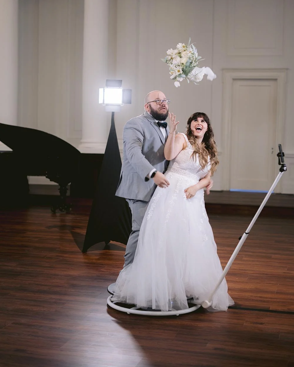 Calgary bride and groom on 360 photobooth .jpg
