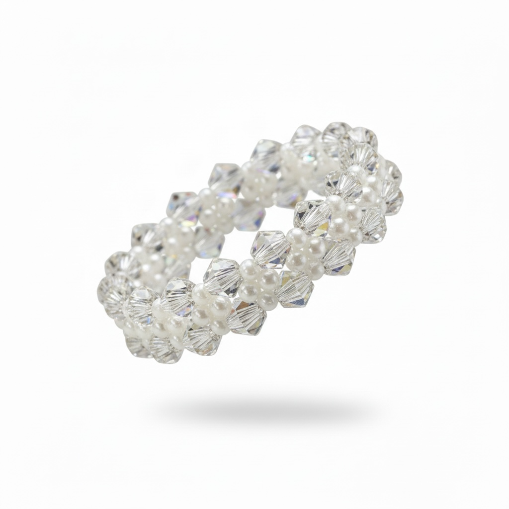A decorative ring with a double-band design, featuring clear and white beads and pearls.