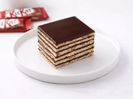 Wafer layers, chocolate cream, and chocolate glaze.