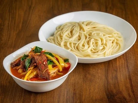 Beef soup with noodles (wheat flour) spices and vegetables.