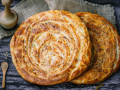 Wheat flour, salt, water, and veg oil.
