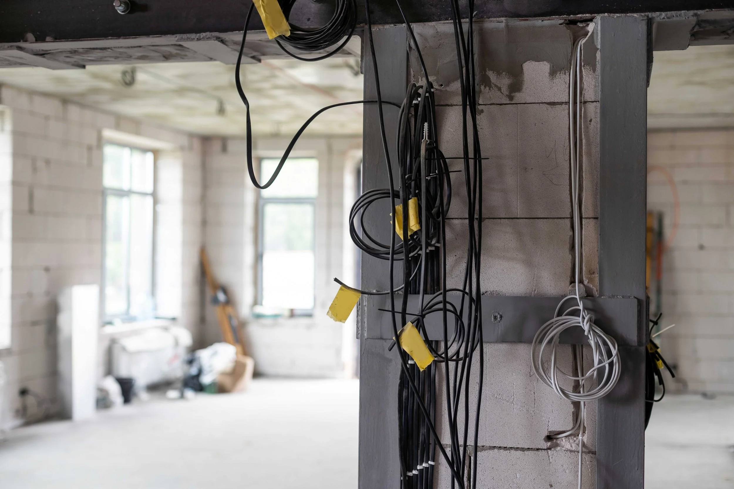 Ground-up commercial electrical wiring and rough-in on an Edmonton construction site