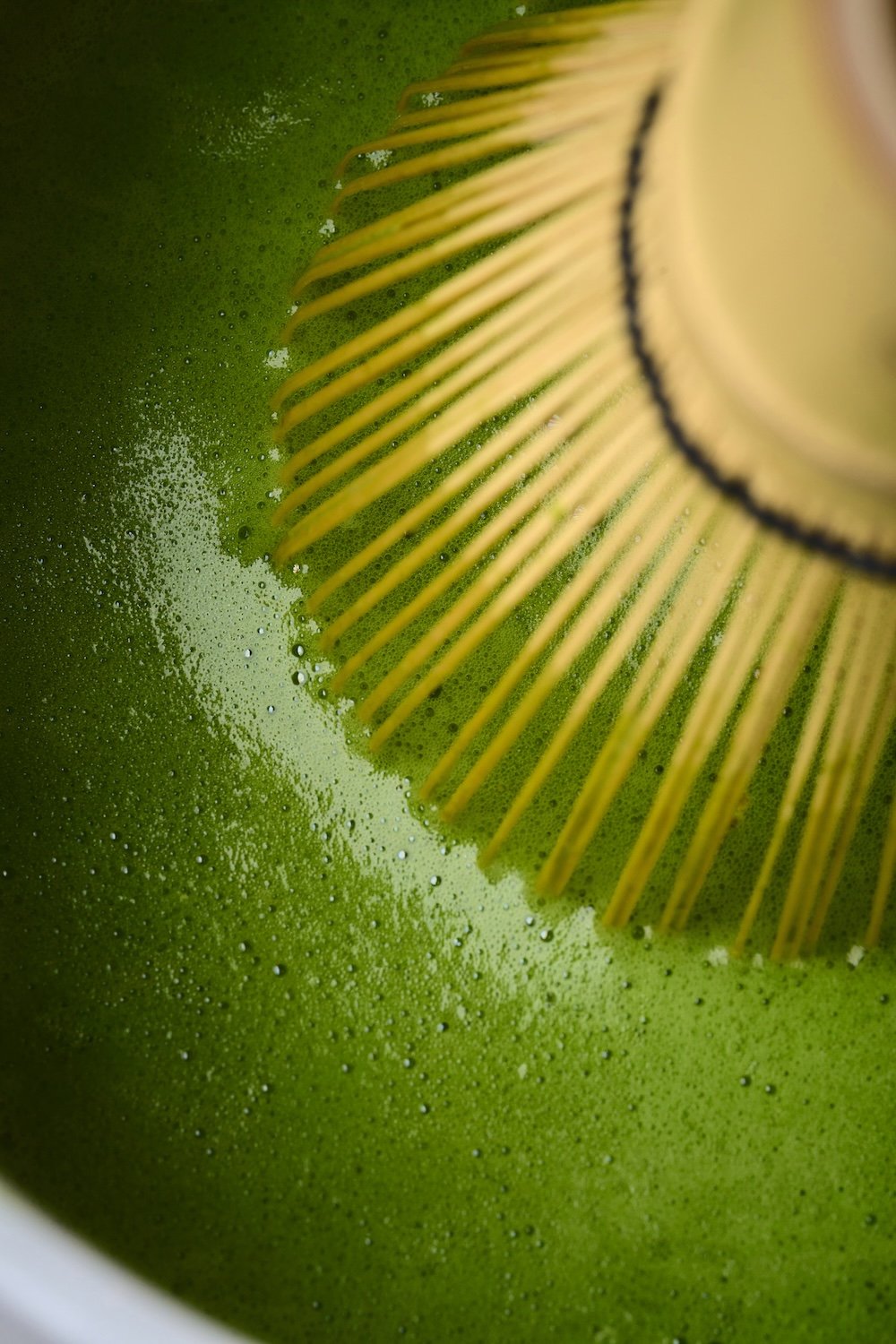 Close-up of matcha being whisked at Matcha Cafe Maiko.