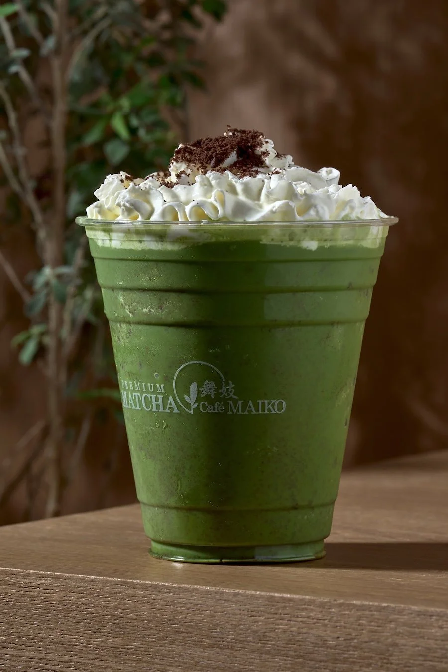 A Oreo Matcha frappe with whipped cream and chocolate crumbs at Matcha Cafe Maiko.