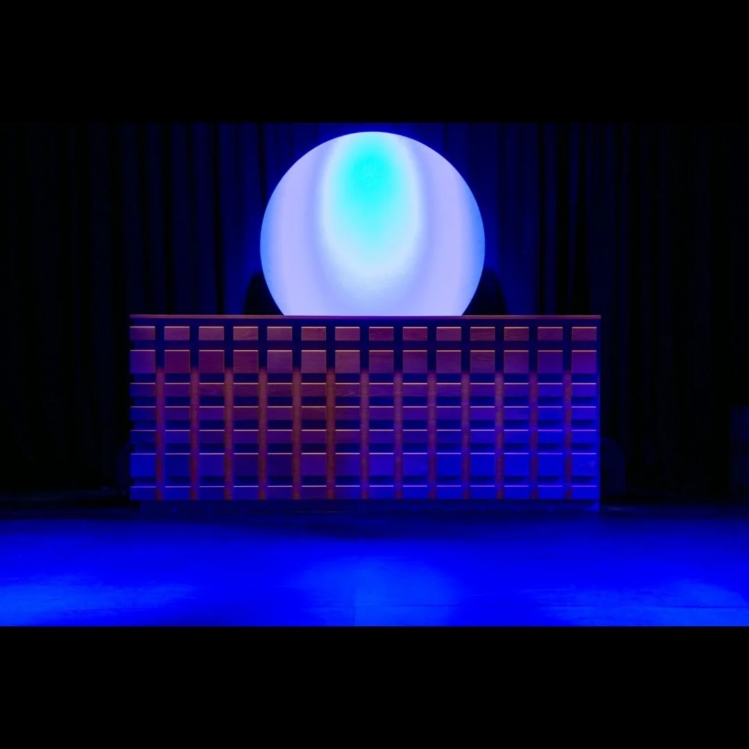 It's a MOOD - wood block DJ booth and suspended wall disc with just the right lighting.

#djboothrental #barrental #eventrentalsLA