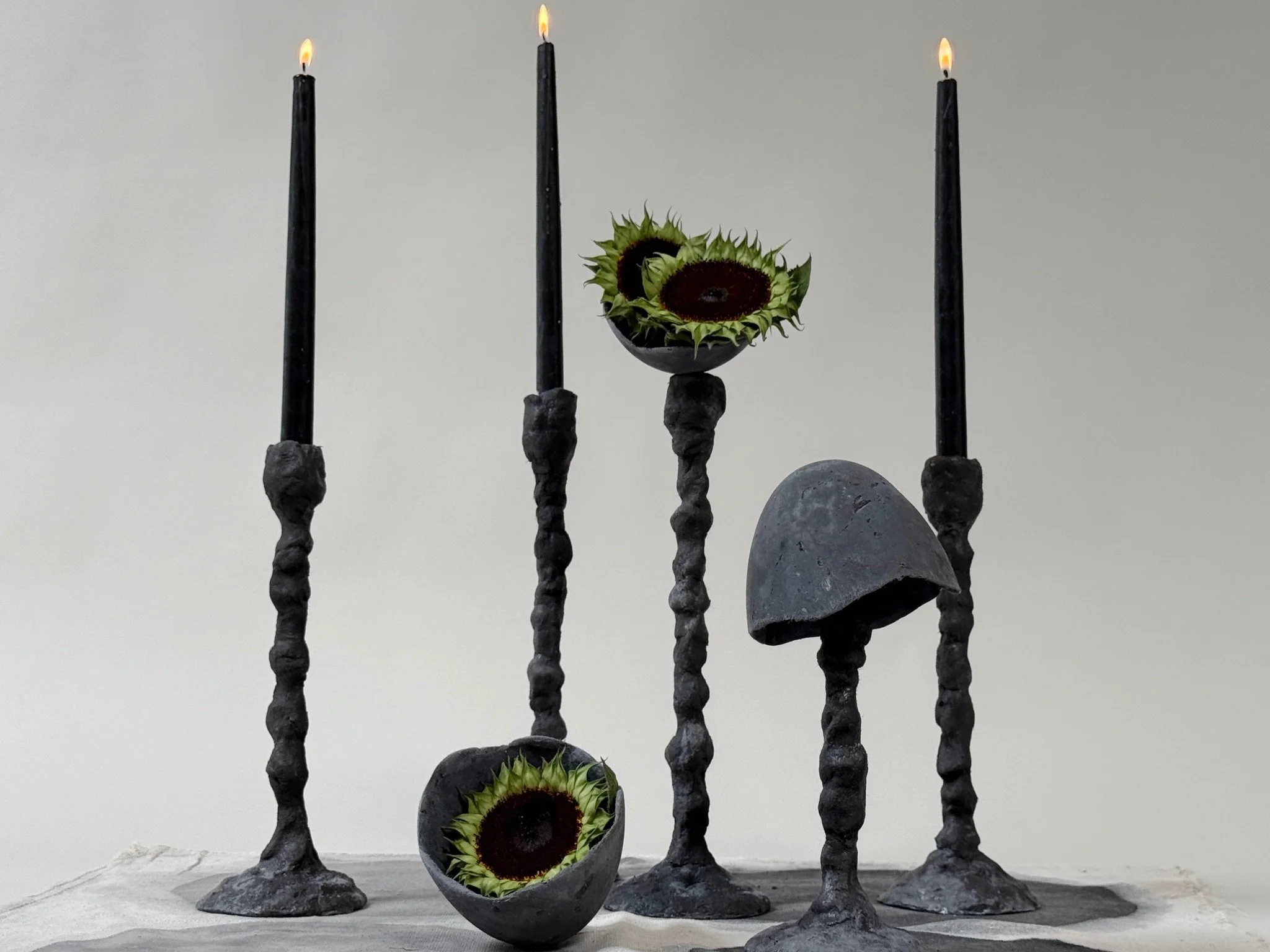 hand formed cement candlesticks
