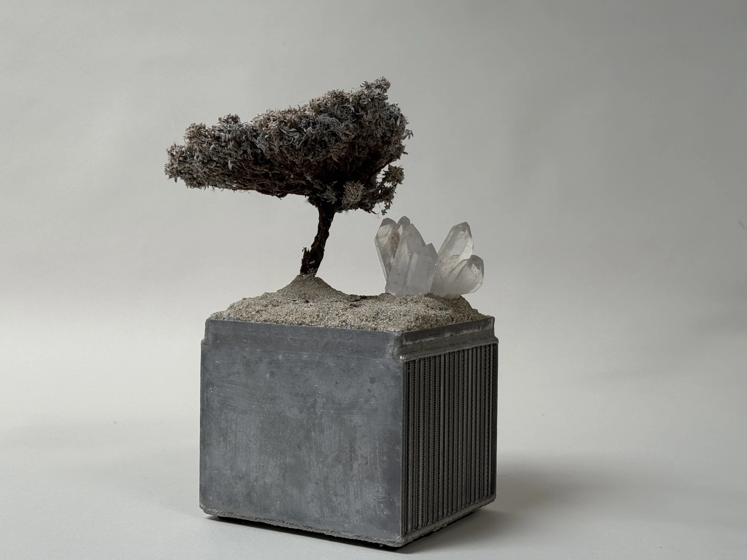 Side view of Arte Povera Landscape by Kept LA showing raw quartz  crystal cluster alongside wire tree form as sustainable decor