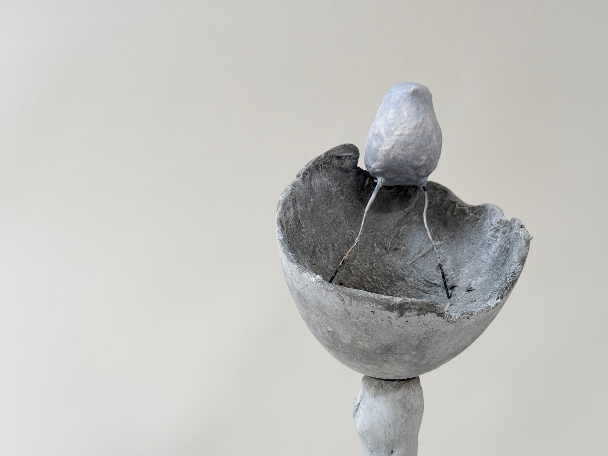 hand formed concrete + bird detail