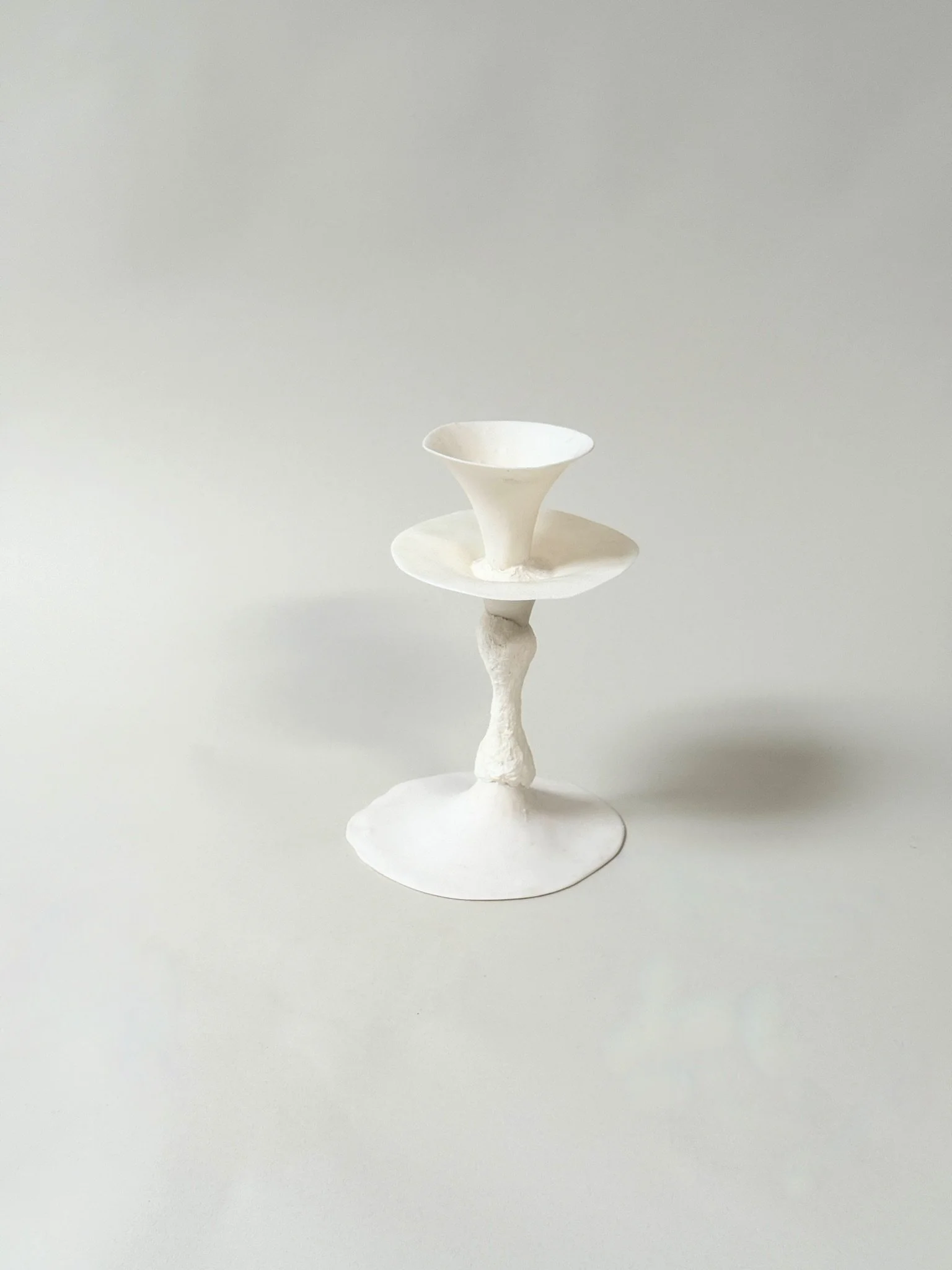 Single Handmade Porcelain Candlestick Vessel by Kept LA showing  double-cup form — upper cup holds water for a single stem or  taper candle, hand-cast mixed media construction each unique