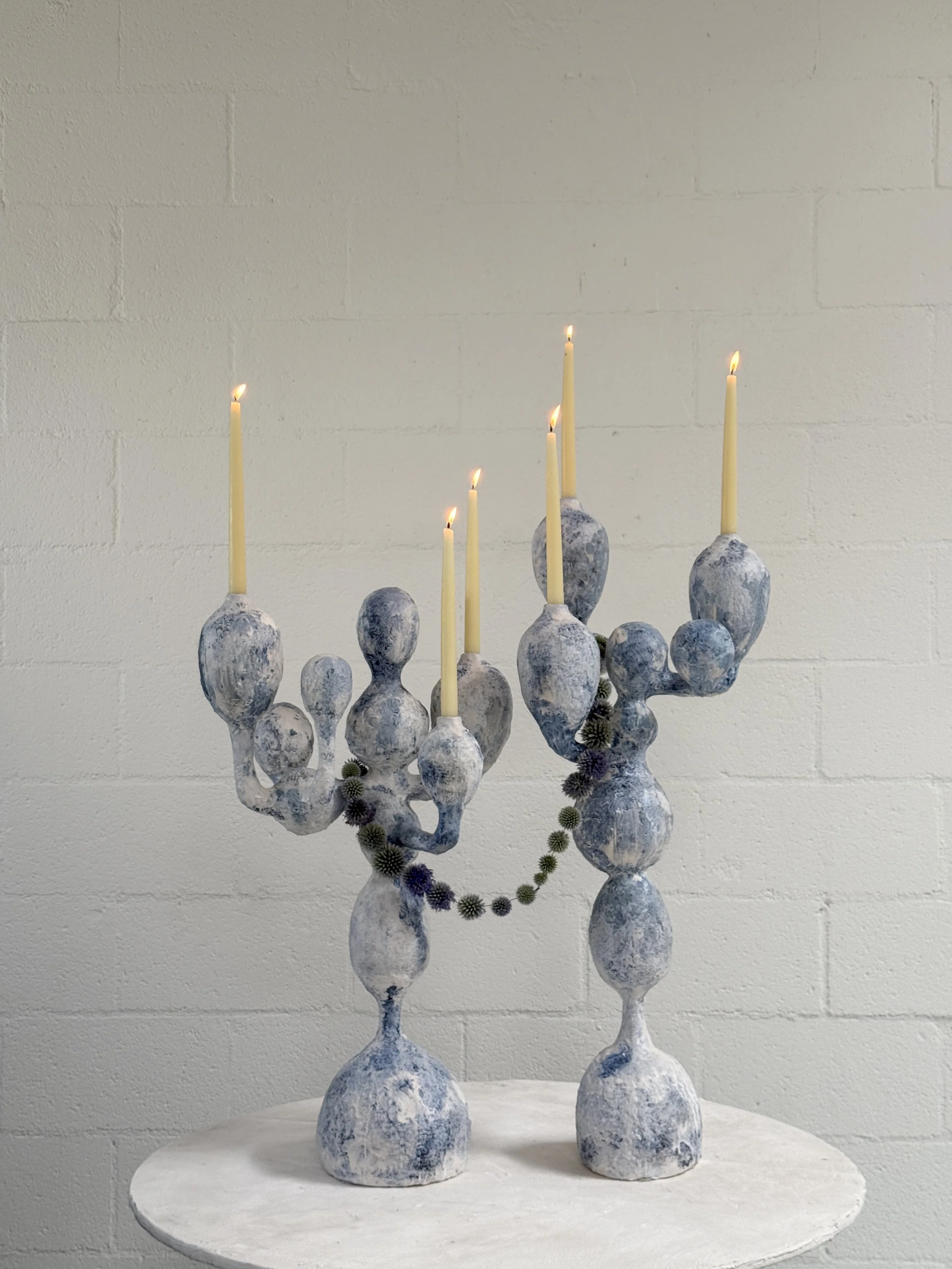 Custom made candelabra with blue thistle and beeswax.