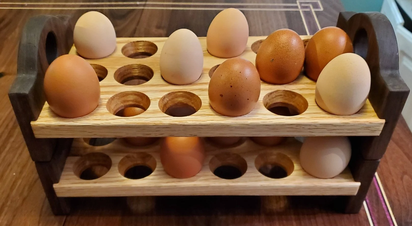Walnut and oak egg holders, and they're stackable. 