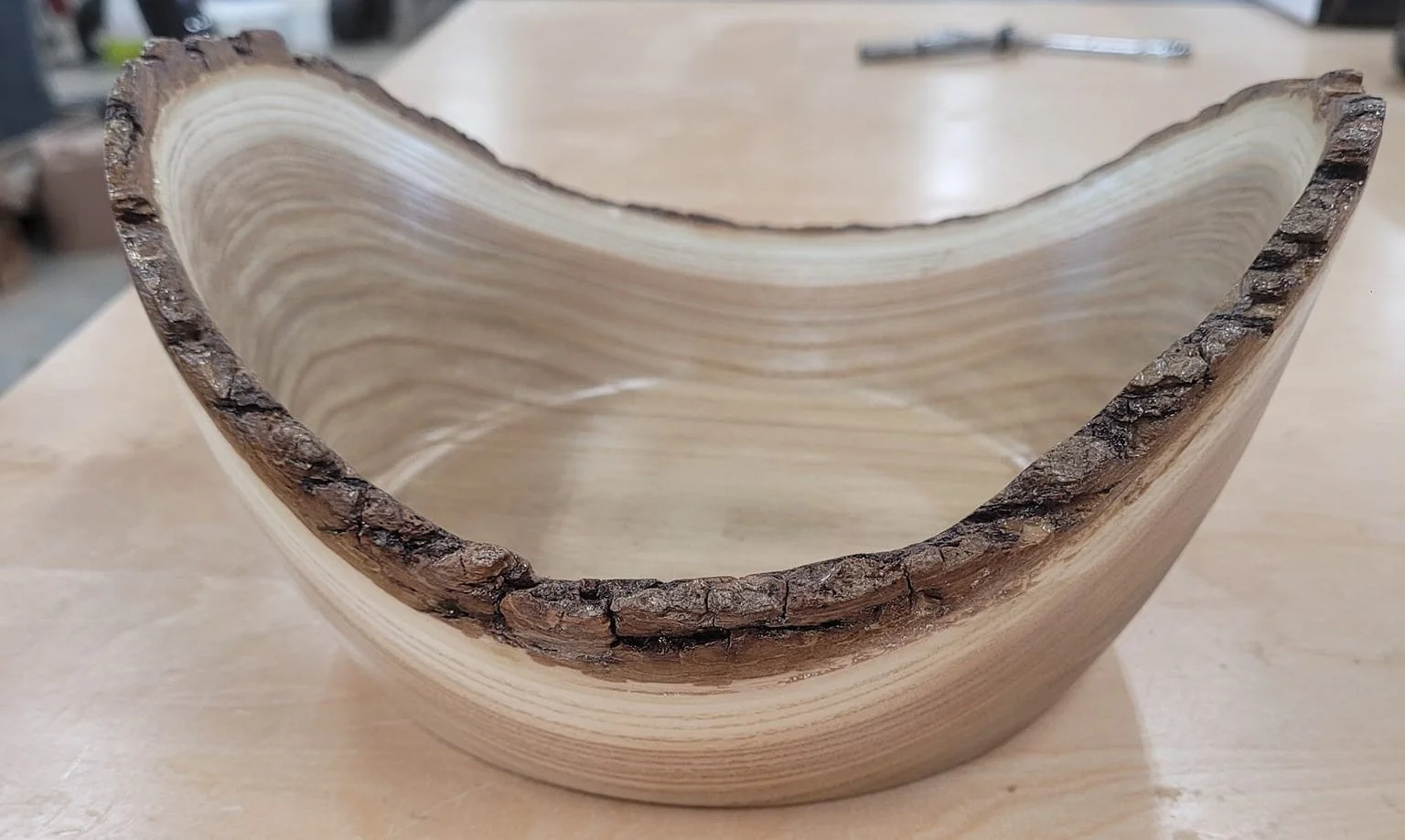 Live edge bowl. I think the wood is black locust.