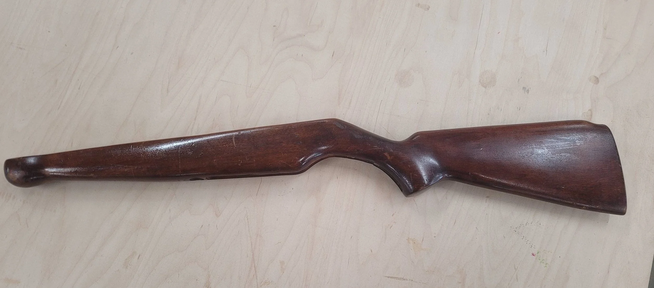 (Before)
Here is a gunstock that I restored. You can see in the before picture where it was held together with a couple of screws. When I took those out it came apart into 2 pieces. I was able to glue it back together and send a dowel all the way thr