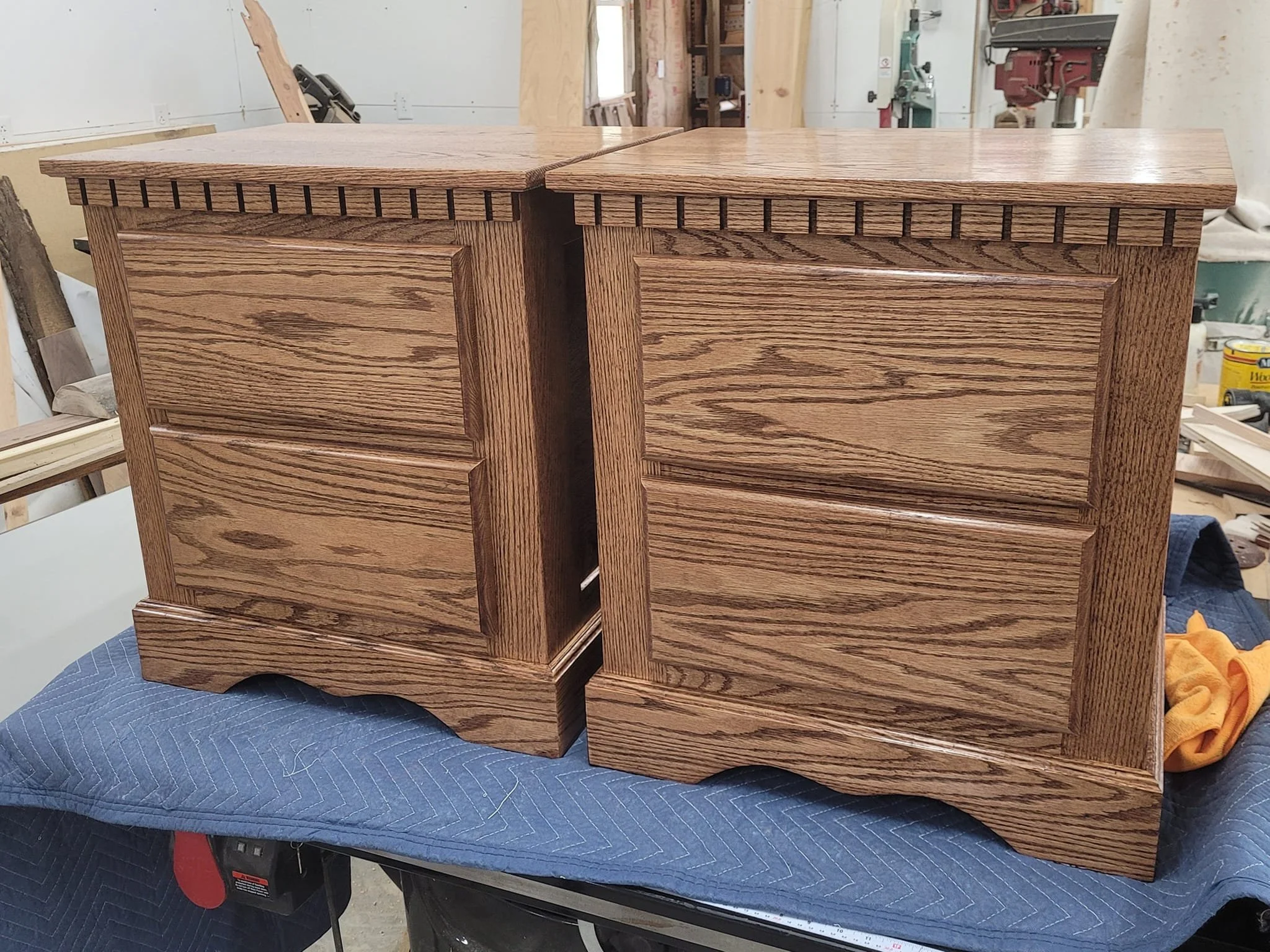  A pair of bedside nightstands made out of red oak with a stain and multiple coats of poly. Traditional joinery all the way around, I didn't want to use screws to hold anything together (other than the drawer slides)