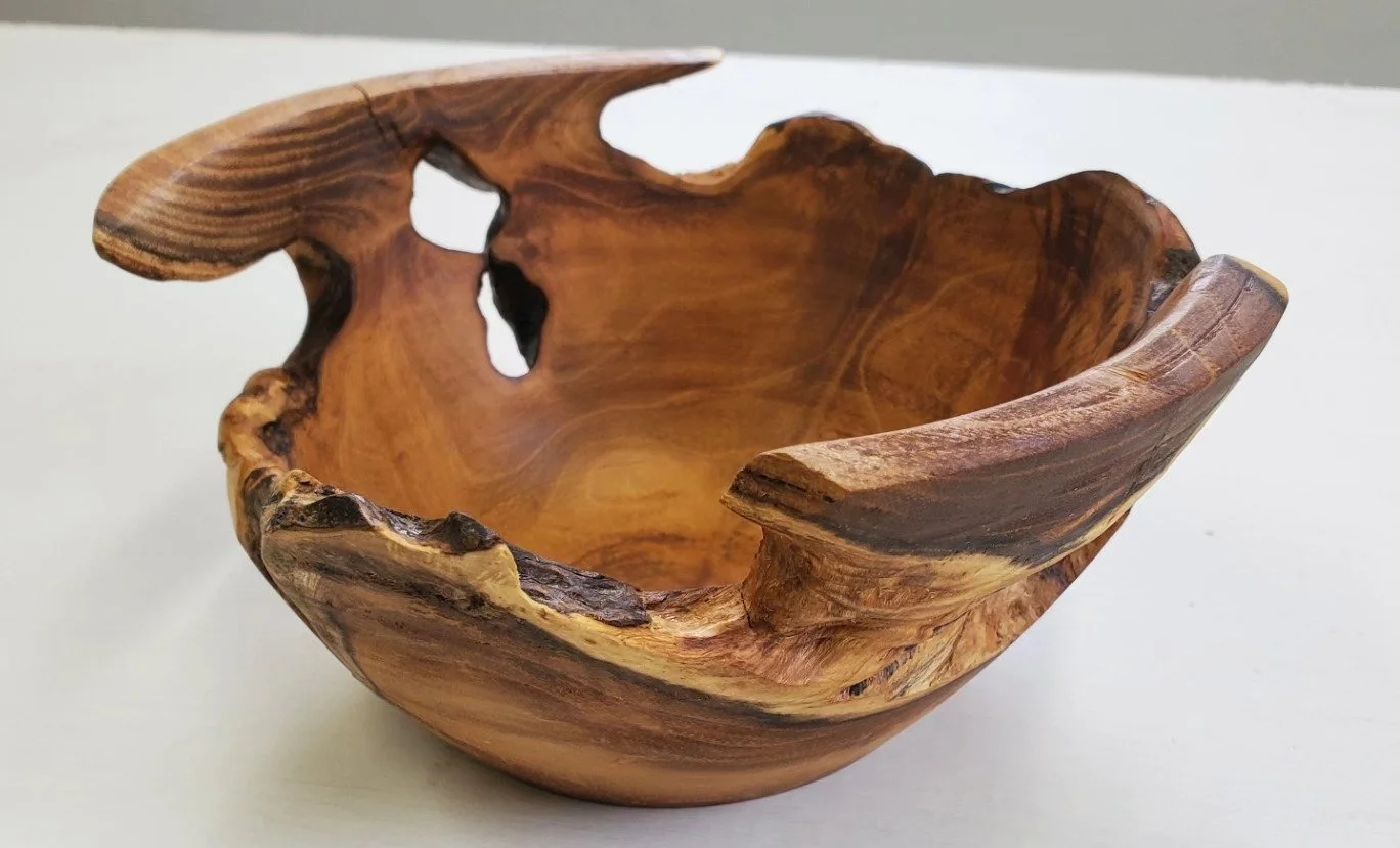 Small wood turned live edge bowl. Natural beauty. Not sure what the wood is but it's definitely hard. My best guess is black locust.