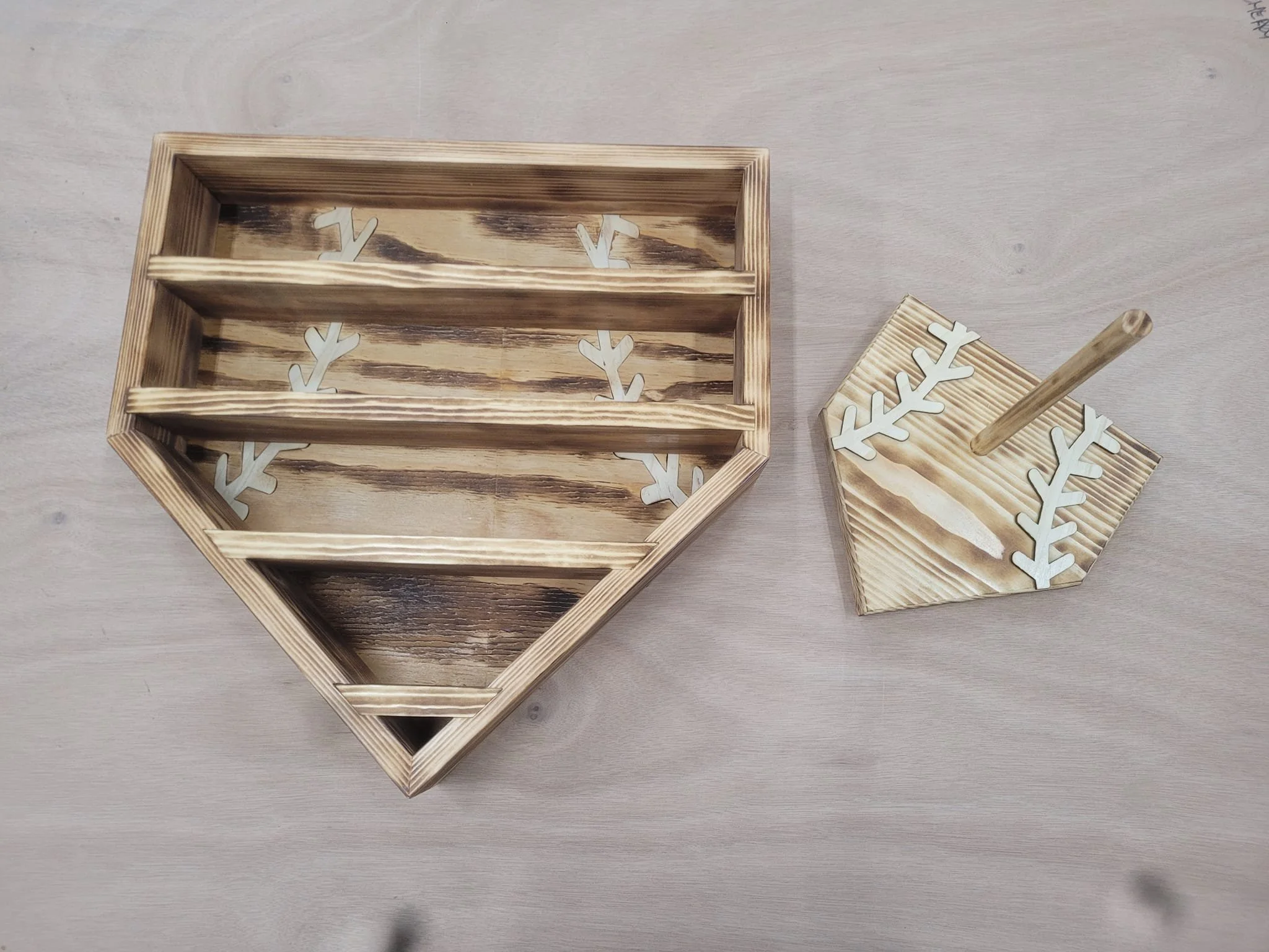 Baseball and ring display made of pine with poplar for the 'stitching'.