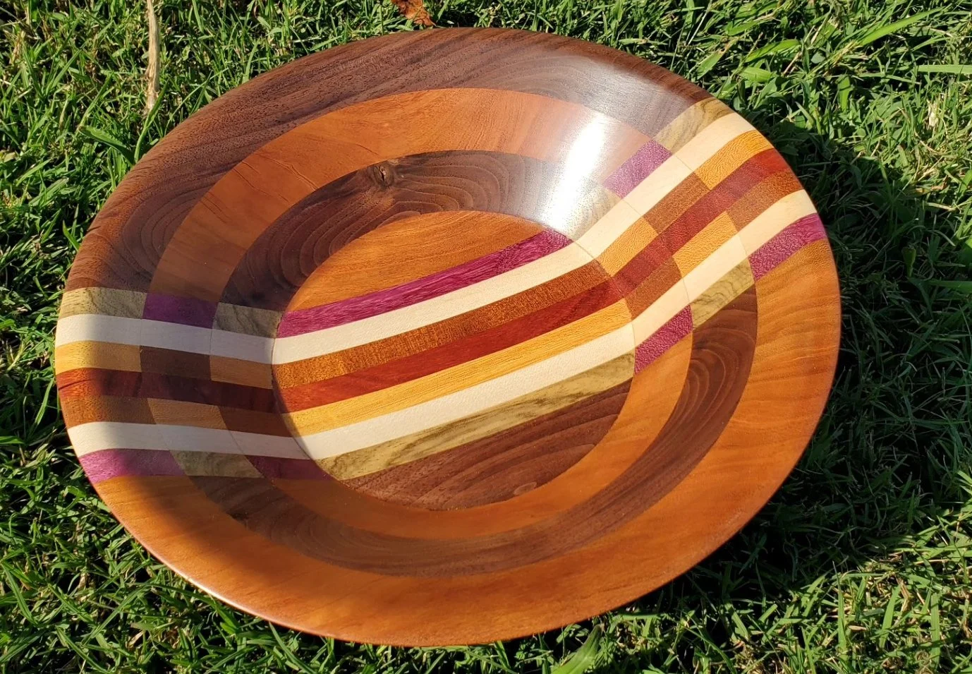 Walnut, cherry, mahogany, purpleheart, black limba, osage orange and maple.