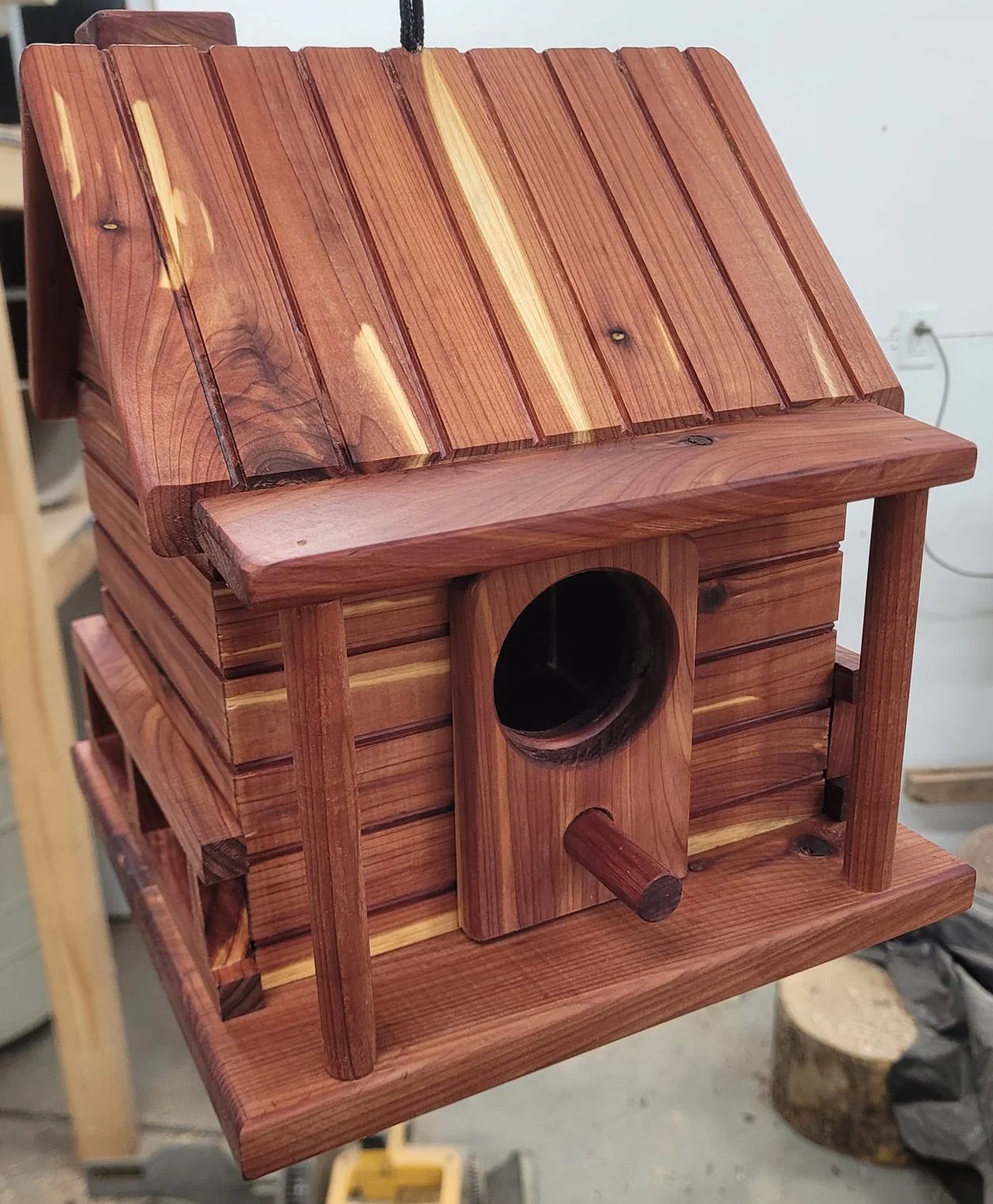 Birdhouse made from red cedar so it should last outside for a long time.