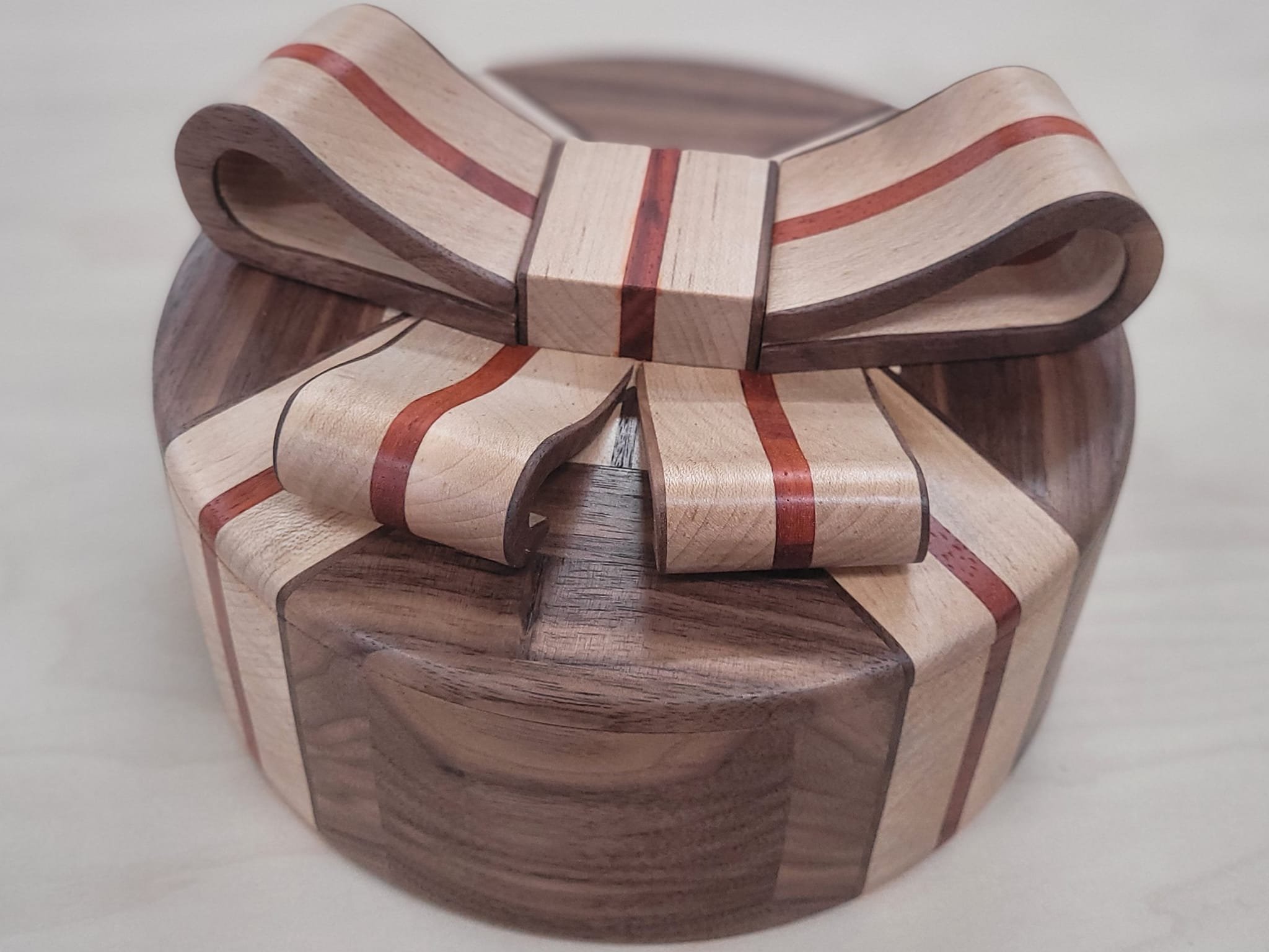 A jewelry box made from padauk, maple and walnut.