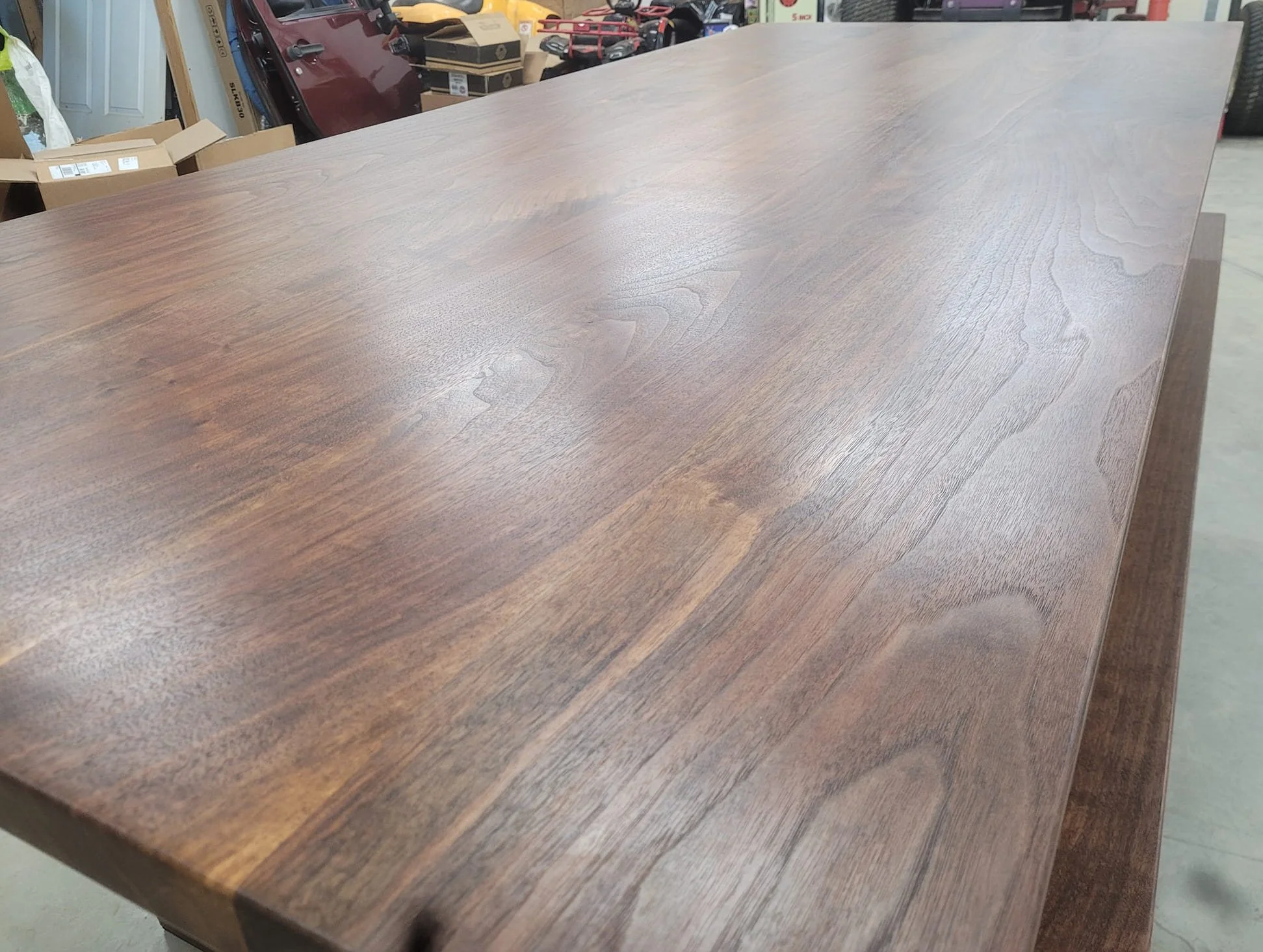 Walnut dining table with two matching benches. 