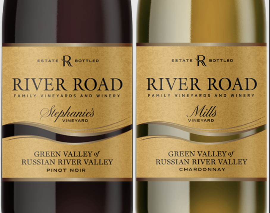Two bottles of River Road family vineyards wine, one labeled Stephanie's Vineyard Pinot Noir and the other labeled Mills Vineyard Chardonnay.