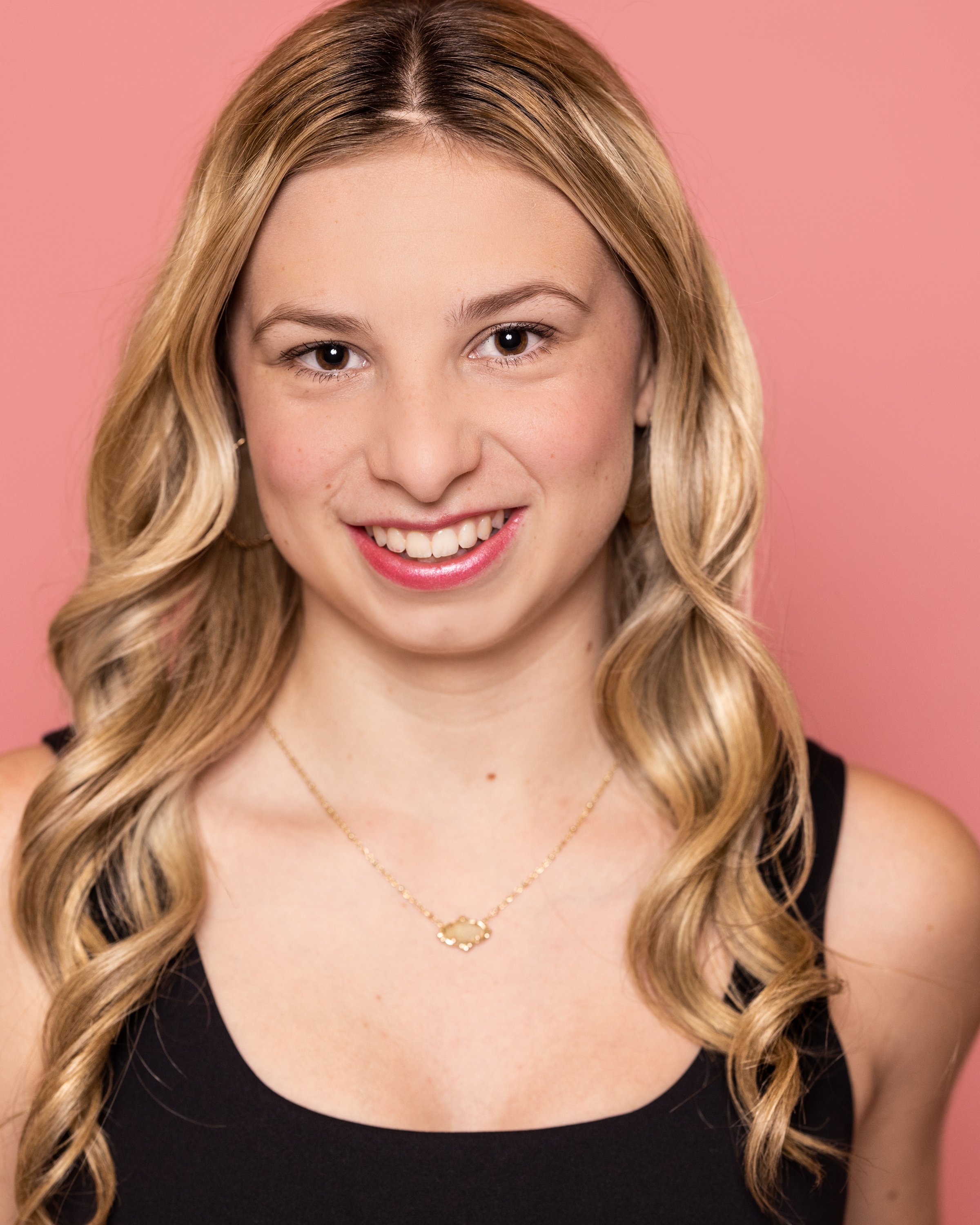 Molly Jones Pink Headshot.jpg
