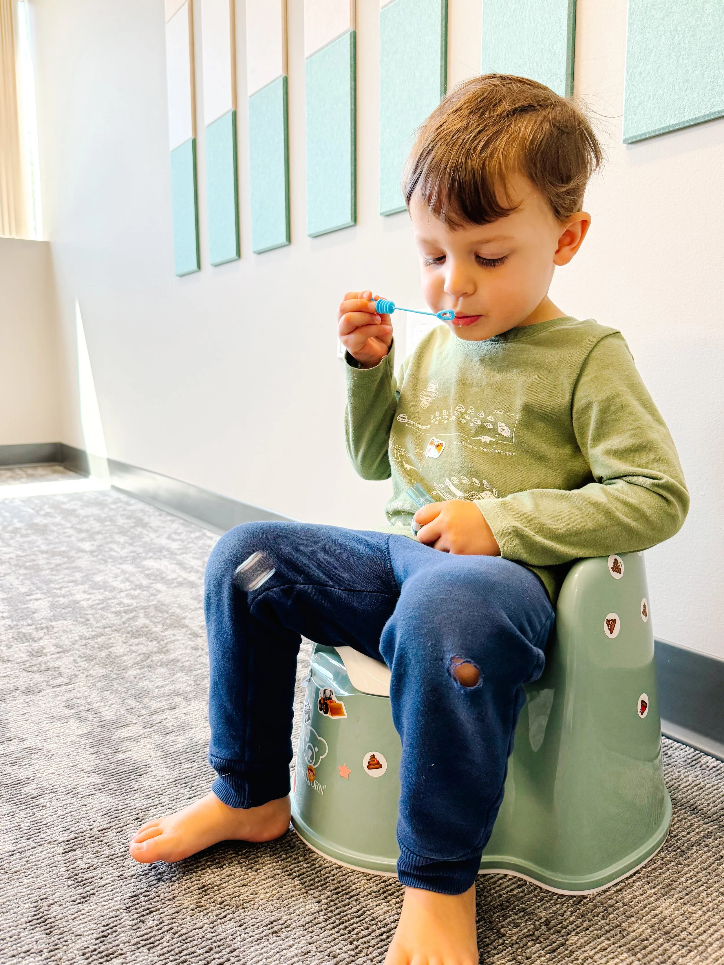 kid blowing bubbles