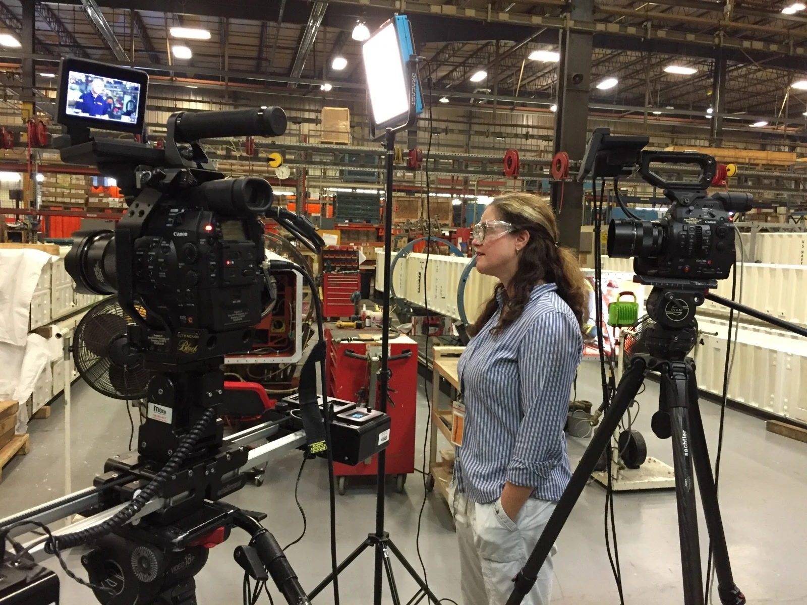 Kerry on location at a large warehouse safety shoot.