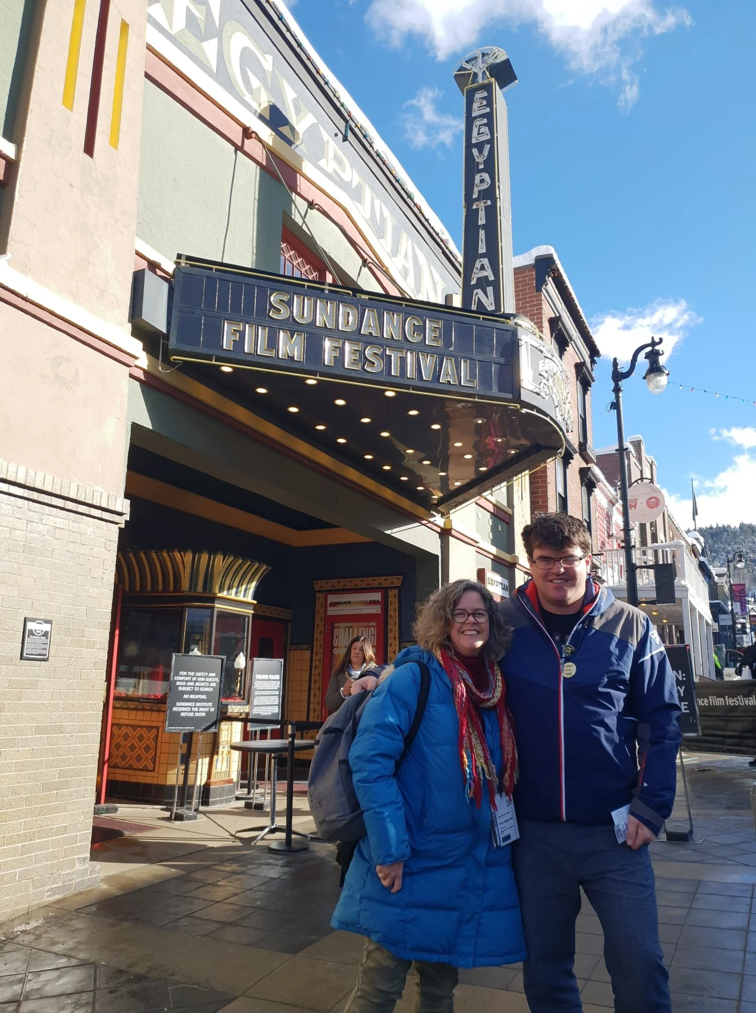Kerry and friend standing in front of the Egyptian Theater on Main Street in Park City, UT at the Sundance Film Festival.