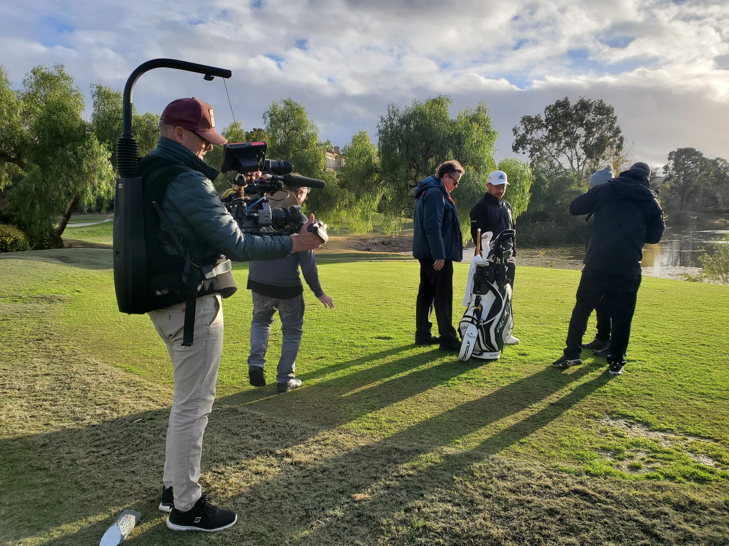 Exhibit A team on location with Xander Schauffele.
