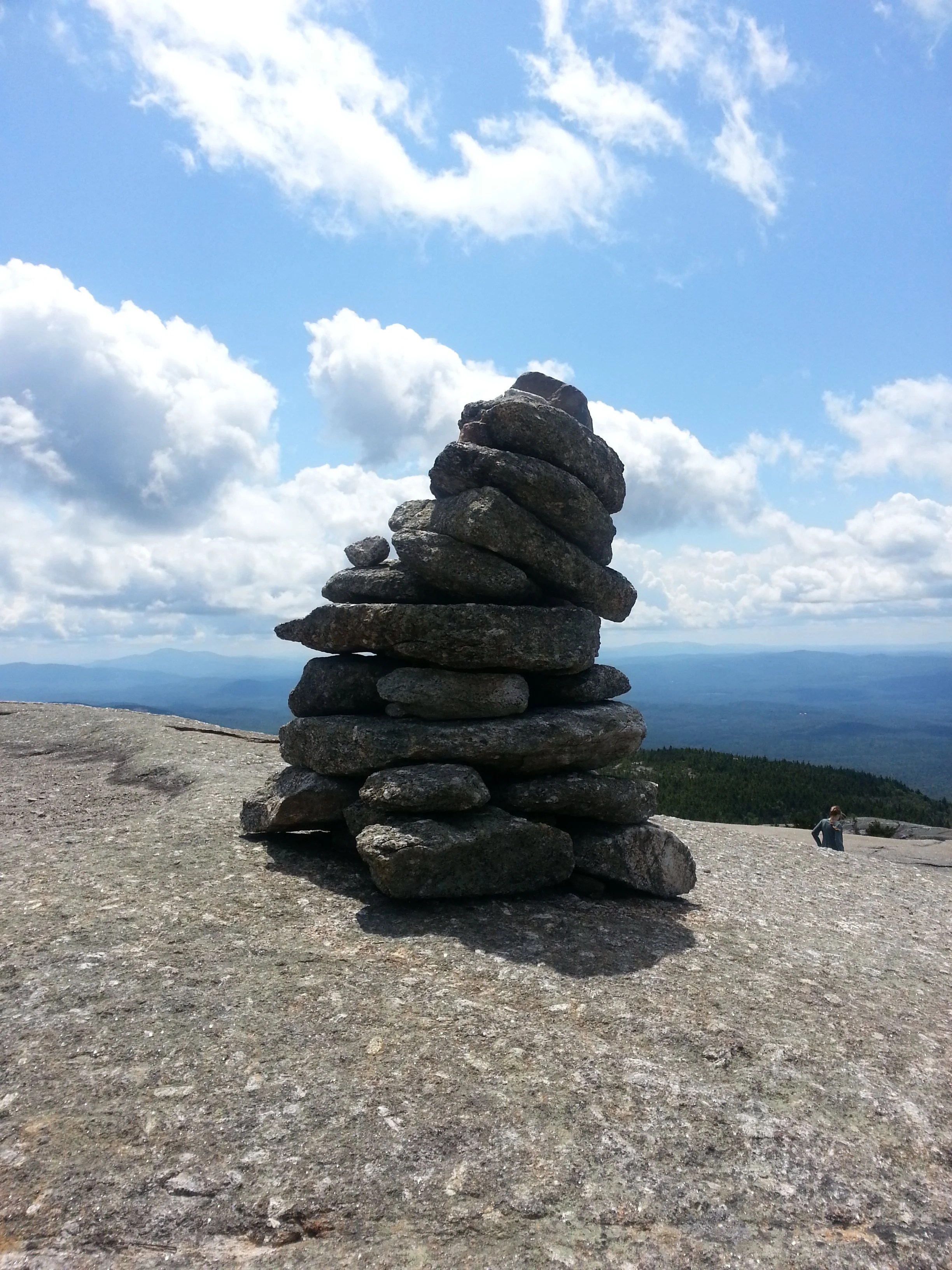 A cairn on top of a mountain.