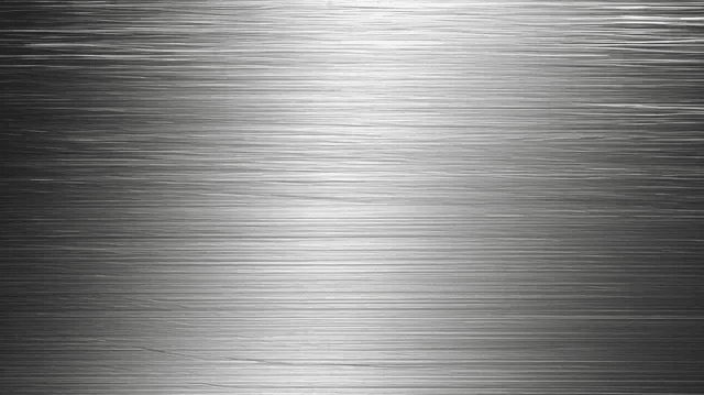Close-up of a brushed platinum surface with horizontal lines