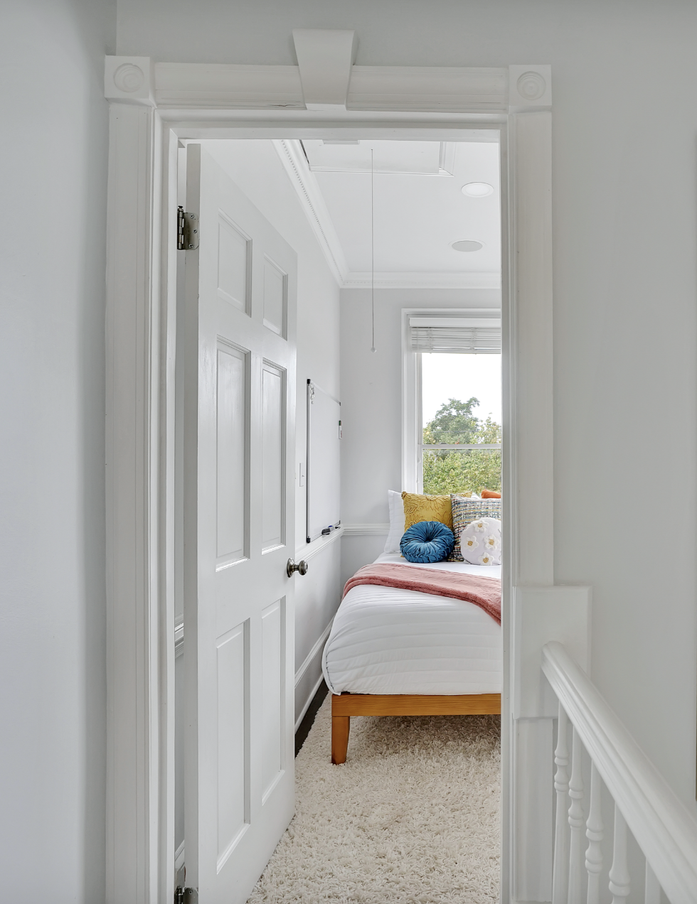 hallway with bedroom at end in rentable Wilmington NC home