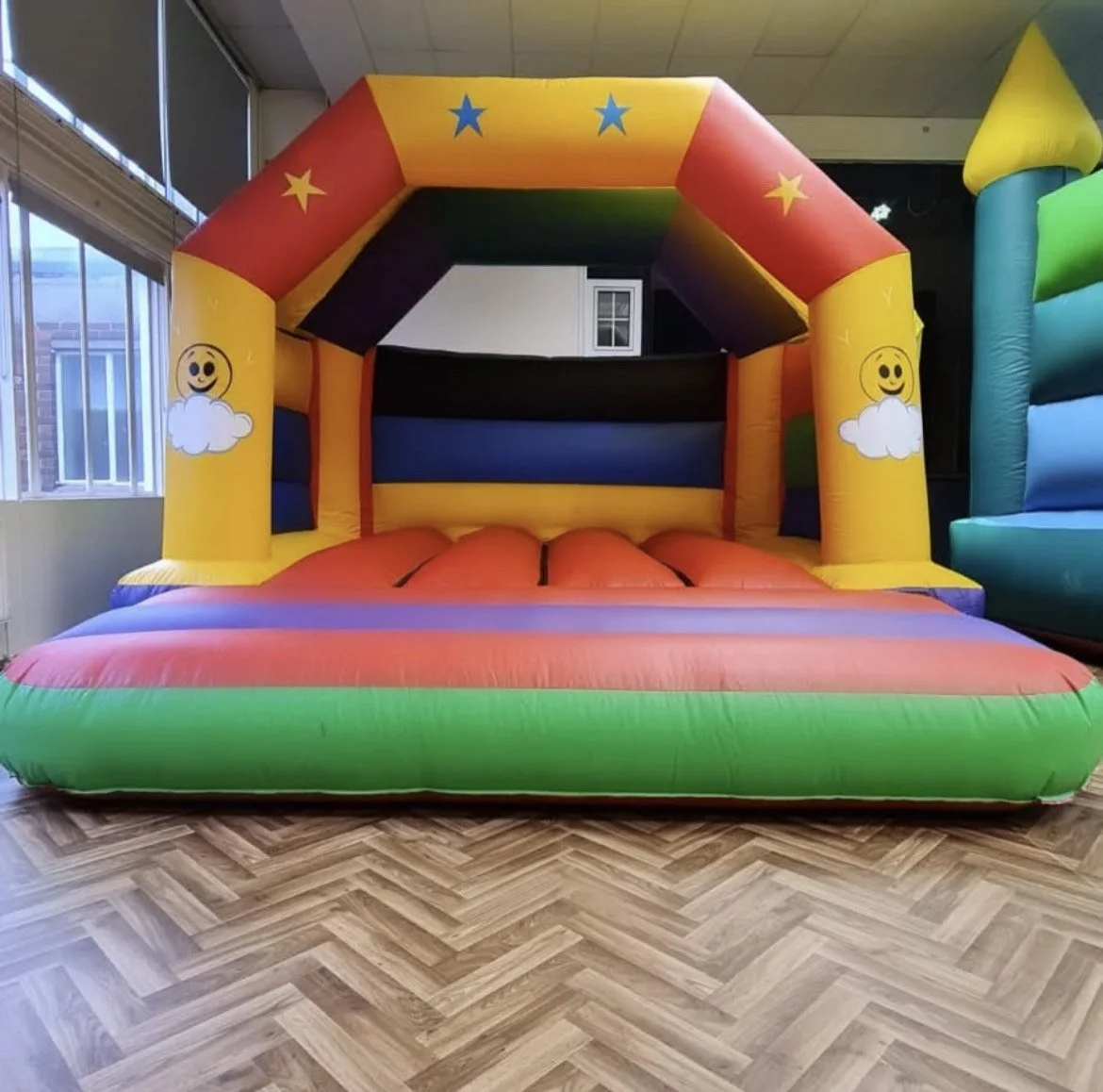 Multi-coloured Bouncy Castle. The perfect castle for any neutral party's. This castle is suitable for children up to the age of 8 years old but is a popular choice for toddlers and younger children due to to the low access height. £120.00 per four ho