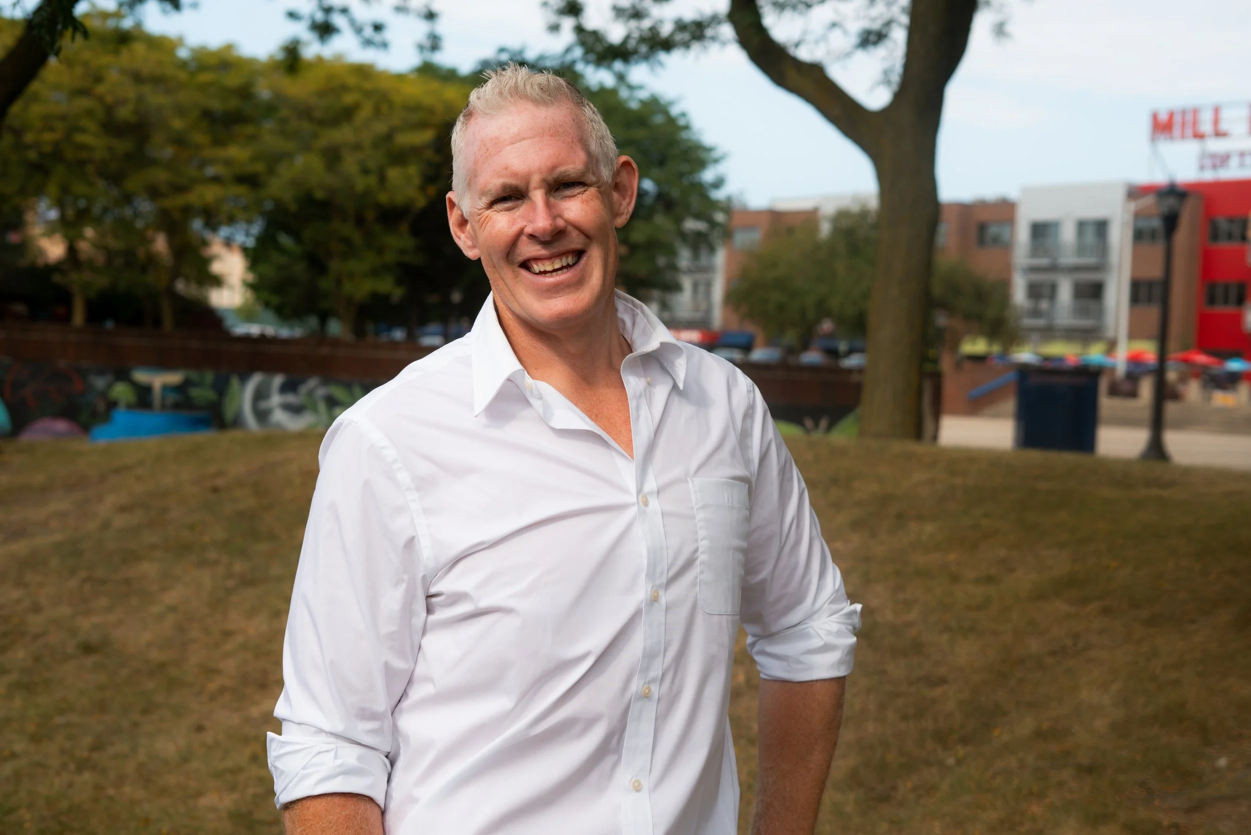 Chris Girard smiling outdoors