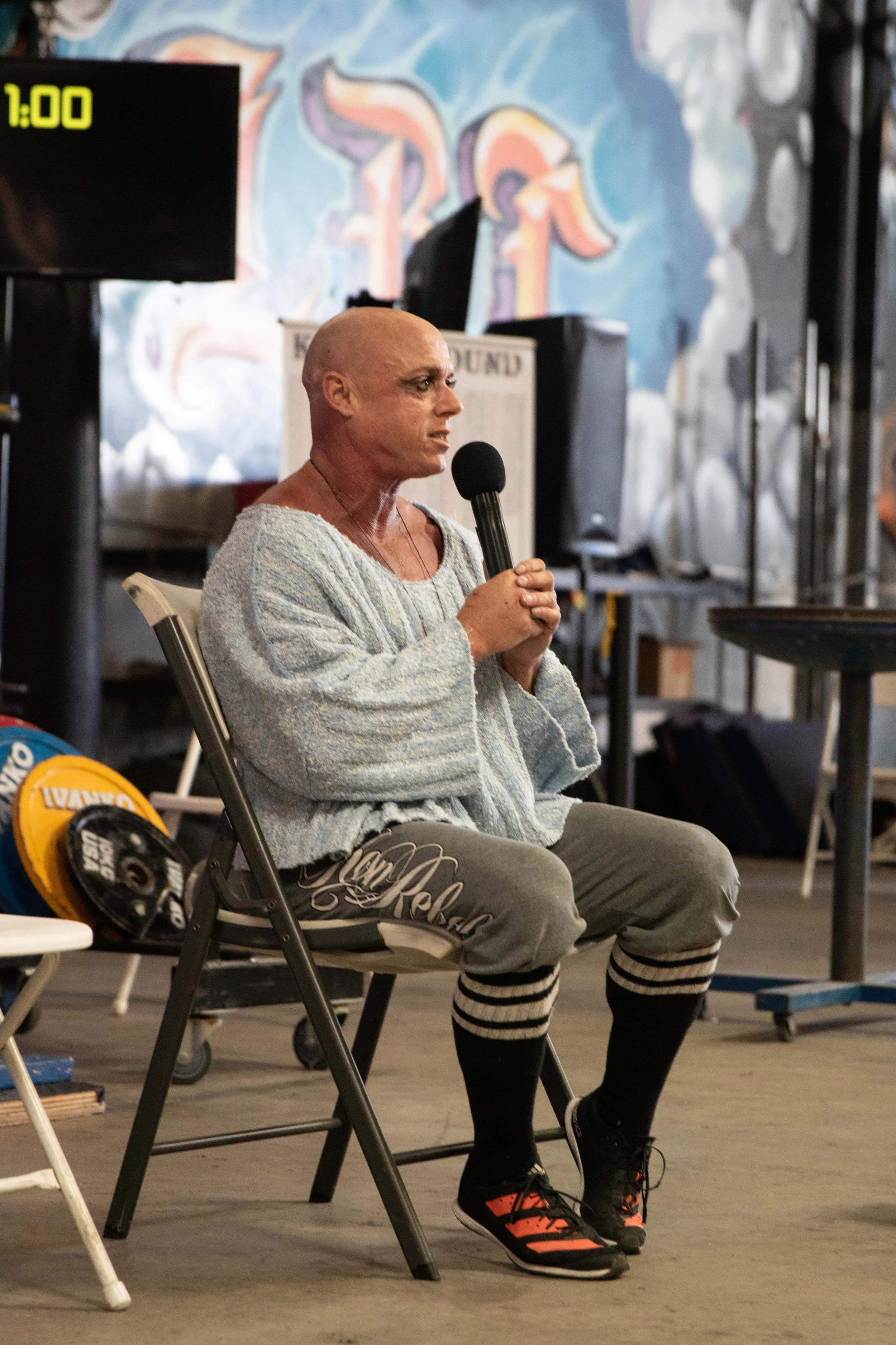 Liz Freel is giving a speech while seated at the annual Liz Freel Classic in 2021.
